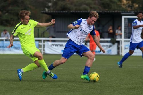 Bedfords Ashton Grant (L) and Enfields Aaron Greenex