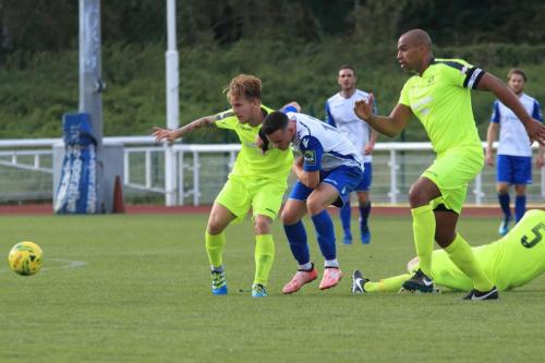 Bedfords Ashton Grant (L) holds off Brandon Adams