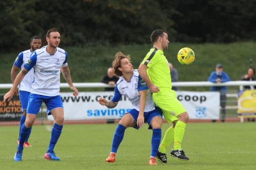 Bedfords Callum Donnelly shields the ball from Sam Chaney