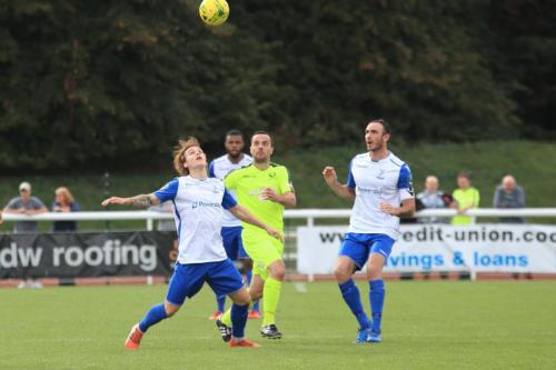 Enfields Sam Chaney (L) and Matt Johnson and Bedfords Callum Donnelly