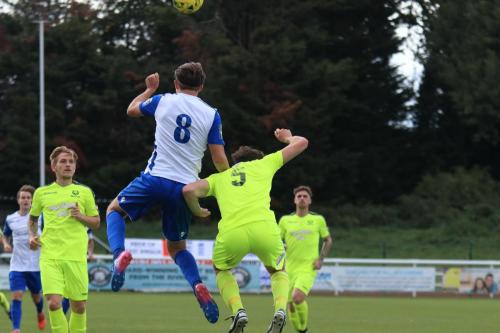 Enfields Sam Youngs (8) wins a challenge with Ollie Swain