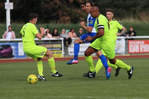 Enfields Sam Youngs and (L-R) Bedfords Ollioe Swain, Gavin Hoyte and Ben Ford