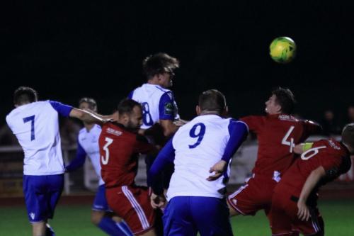 Enfields Sam Youngs wins a header