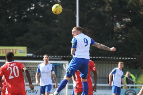 Billy Bricknell heads the ball on