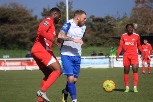 Carshaltons Daniel Pappoe (L) and Christie Pattison and Enfields Billy Bricknell