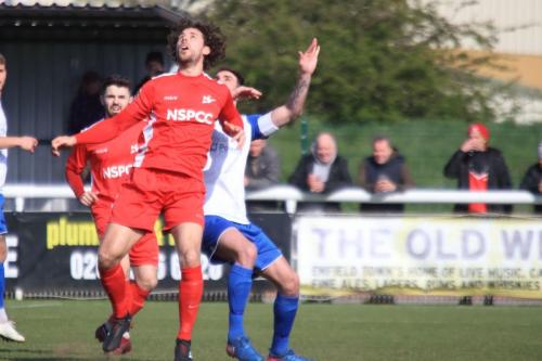 Carshaltons Harry Ottaway (red) and Enfields Matt Johnson