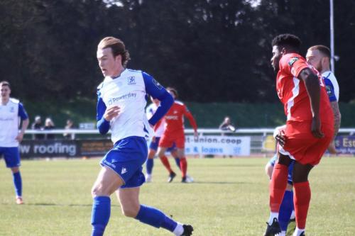 Carshaltons Paris Hamilton-Downes (red) clears from Mickey Parcell