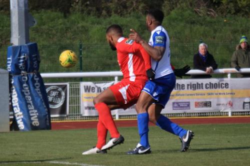 Carshaltons Taofiq Olomowewe (L) and Enfields Kezie Ibe