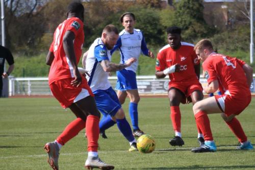 Enfields Billy Bricknell marked by Jacob Mendy (L), Paris Hamilton-Downes and Luke Read (R)