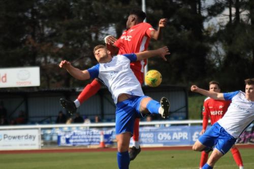 Enfields Dan Rumens (white, L) challenges Paris Hamilton-Downes as Josh Davison lines up a shotx