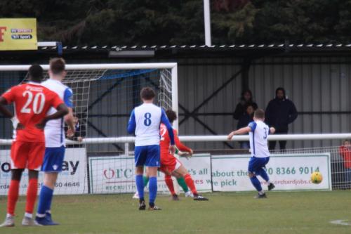 Enfields Jay Porter (3) clears the rebound after Joe Wrights penalty save