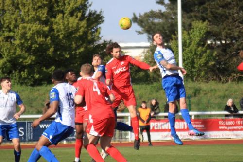 Enfields Matt Johnson (R) wins a header