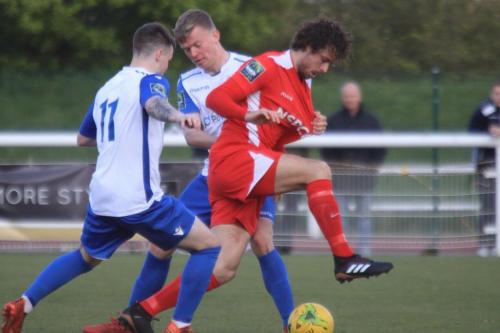 Enfields Sam Chaney (L) and Joe Payne and Carshaltons Harry Ottaway