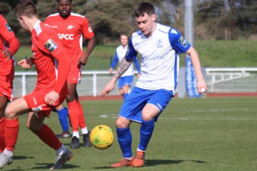 Enfields Sam Chaney (R) and Carshaltons Bobby Price (L) and Paris Hamilton-Downes