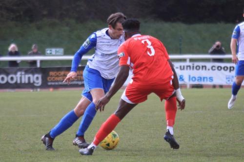 Enfields Sam Youngs turns inside Paris Hamilton-Downes