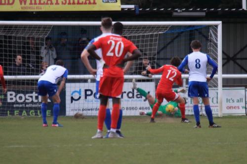 Joe Wright saves a penalty from Harry Ottaway (12)