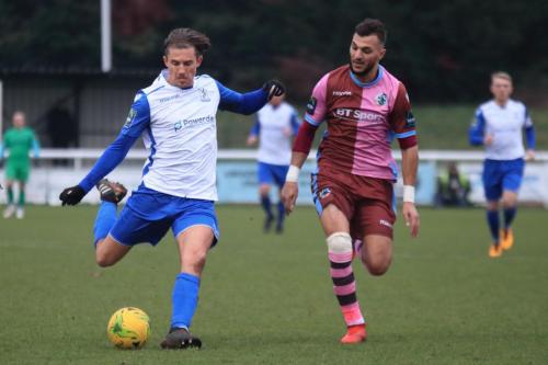 Enfields Sam Youngs (L) and Casuals Mu Maan