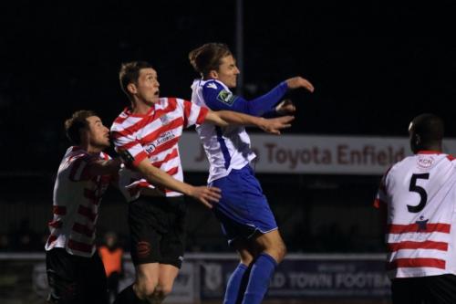 Enfields Sam Youngs (white blue) challenges Connor Dymondx