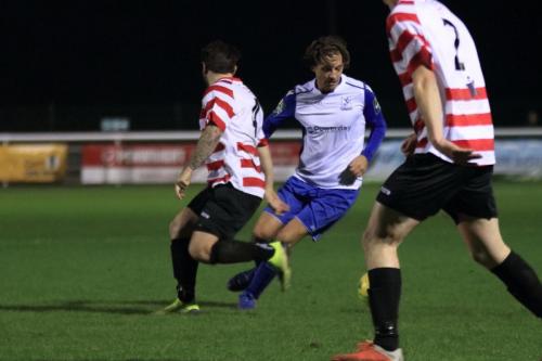 Enfields Sam Youngs and Kingstonians Aaron Lamont (L) and Connor Dymond