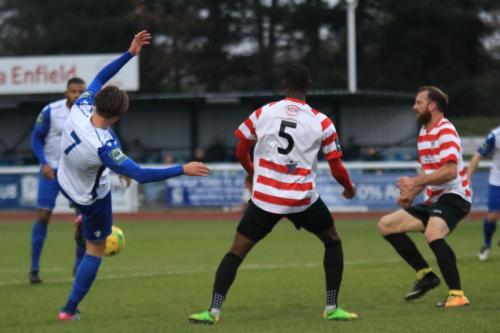 Enfields Sam Youngs and Kingstonians Temi Eweka (5) and Jay Gasson