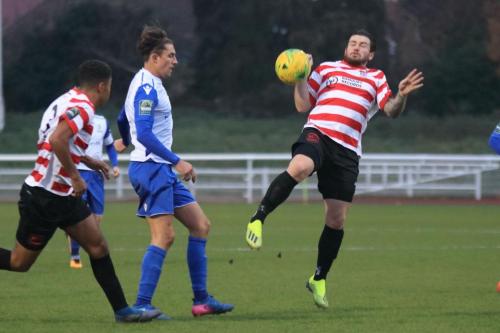 Kingstonians Aaron Lamont (R) and Tyler Brown and Enfields Sam Youngs