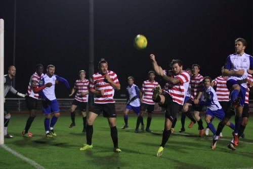 Kingstonians Aaron Lamont clears