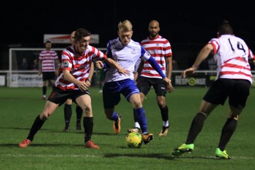 Kingstonians Connor Dymond (L) challenges Ryan Blackman
