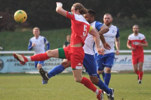 Leatherheads Will Salmon (5) and Enfields Kezie Ibe