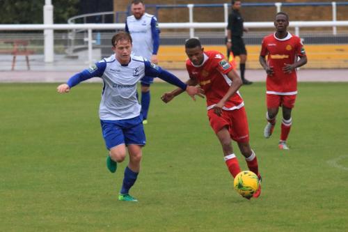 Enfields Aaron Greene (L) and Mersthams Gus Sow