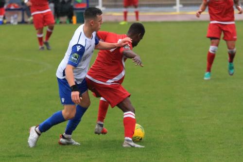 Enfields Brandon Adams (L) and Mersthams Kershaney Samuels