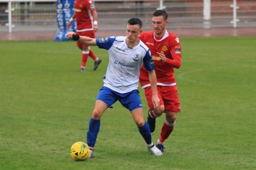 Enfields Brandon Adams (L) and Mersthams Simon Cooper