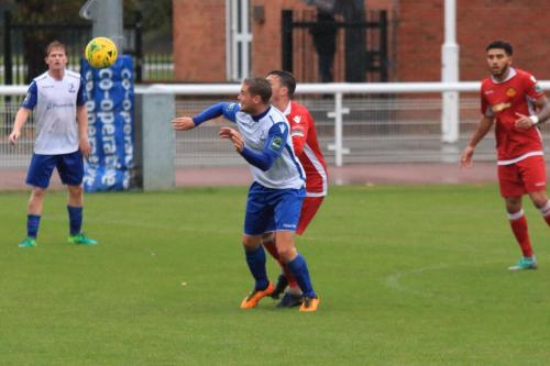 Enfields Liam Hope (white) and Mersthams Simon Cooper