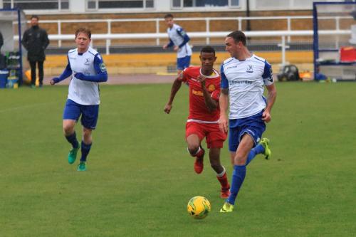 Enfields Matt Johnson (R) and Aaron Greene and Mersthams Gus Sow