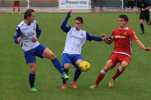 Enfields Mickey Parcell (L) and Sam Chaney and Mersthams Fabio Saraiva