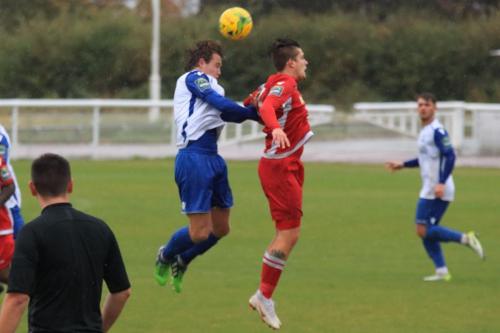 Enfields Sam Chaney (L) and Mersthams Calum Davies