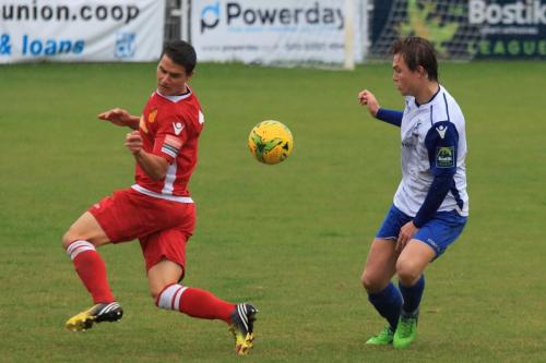 Mersthams Fabio Saraiva (L) and Enfields Mickey Parcell
