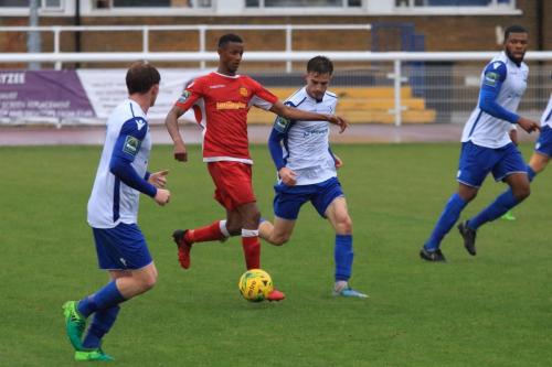 Mersthams Gus Sow (red) and Enfields Aaron Greene (L), Bilal Sayoud and Taofiq Olomowewe (R)