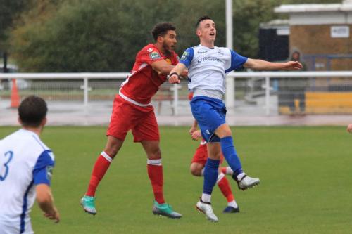 Mersthams Harry Osborne (L) and Enfields Brandon Adams