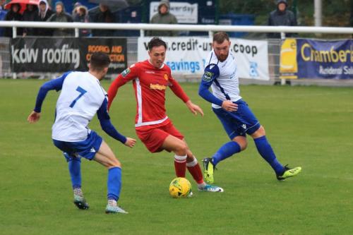Mersthams Jake Hutchings and Enfields Bilal Sayoud (L) amd Billy Bricknell