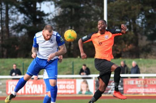 Enfields Billy Bricknell (L) heads wide