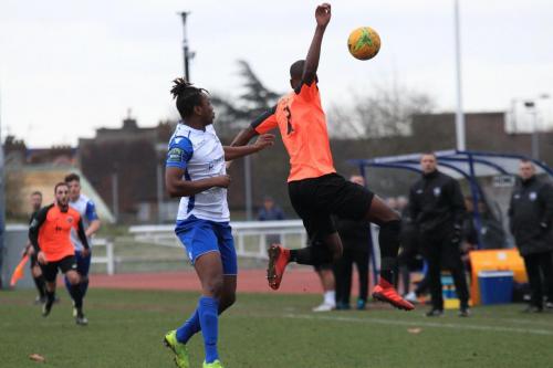 Enfields Karl Oliyide (L) and Tonbridges James Folkes