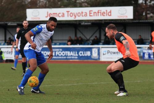 Enfields Kezie Ibe (L) and Tonbridges Arthur Leex