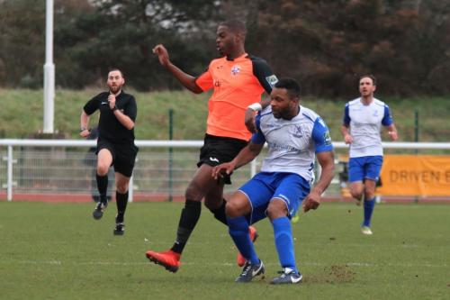 Enfields Kezie Ibe (R) and Tonbridges James Folkes