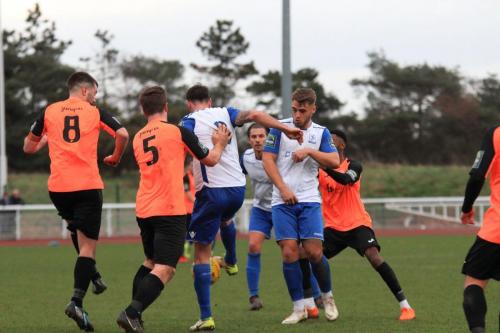 Enfields Matt Johnson (white, L) and Dan Rumens and Tonbridges Tom Parkinson (8) and Sonny Miles