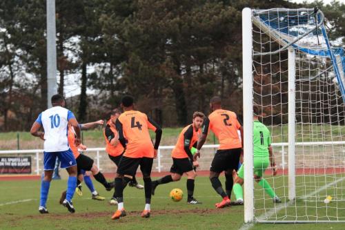 The Tonbridge defence combines to block a shot from Billy Bricknell
