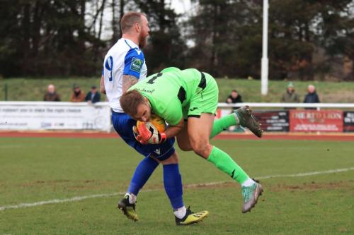 Tonbridge keeper Jonathan Henly saves from Billy Bricknell
