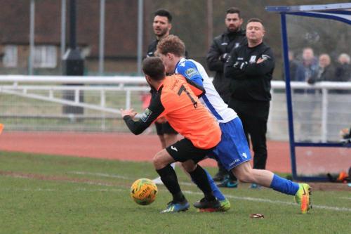 Tonbridges Adem Ramadan (L) and Enfields Aaron Greene