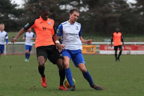 Tonbridges James Folkes (L) and Enfields Sam Youngs