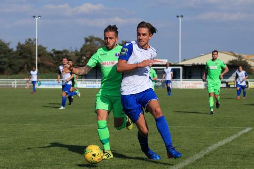 Dorkings Jerry OSullivan (L) and Enfields Sam Youngs