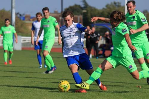 Dorkings Jerry OSullivan (R) challenges Sam Chaney